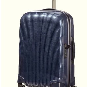 Samsonite carry on size over all dimensions 21.7” x 15.7” x 7.9” weight 3.6 lbs